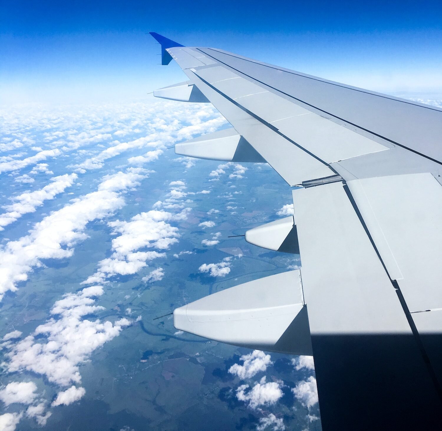 airplane-wing-in-the-sky.jpg